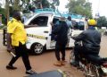 Police battles Entebbe Taxi touts over attacking Fly Express Operators, Passengers