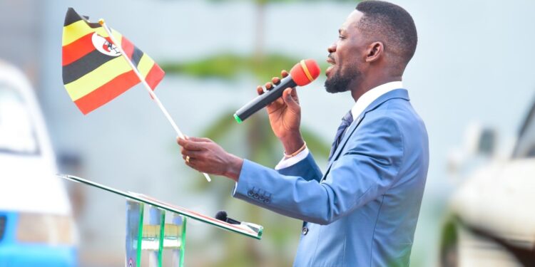 Defend People Brutalised for Holding Uganda Flag: Bobi Wine Urges